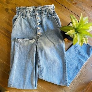 Paper bag waist, button fly straight leg jeans.